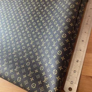 LV Black Vinyl fabric with mini gold Patterns