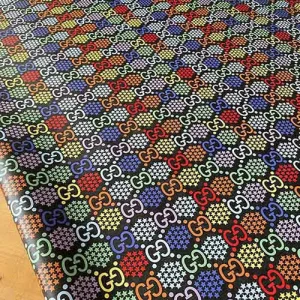 Gucci Multicolor Vinyl Fabric on black background