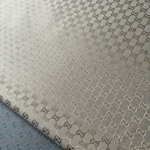 Ivory Gucci Fabric with Gold Patterns