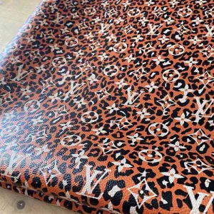 LV Leopard Leather Fabric | Louis Vuitton material with orange leopard pattern