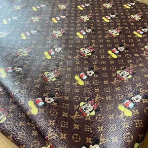 LV Mickey Mouse Fabric | Louis Vuitton fabric with Mickey and Minnie Mouse pattern